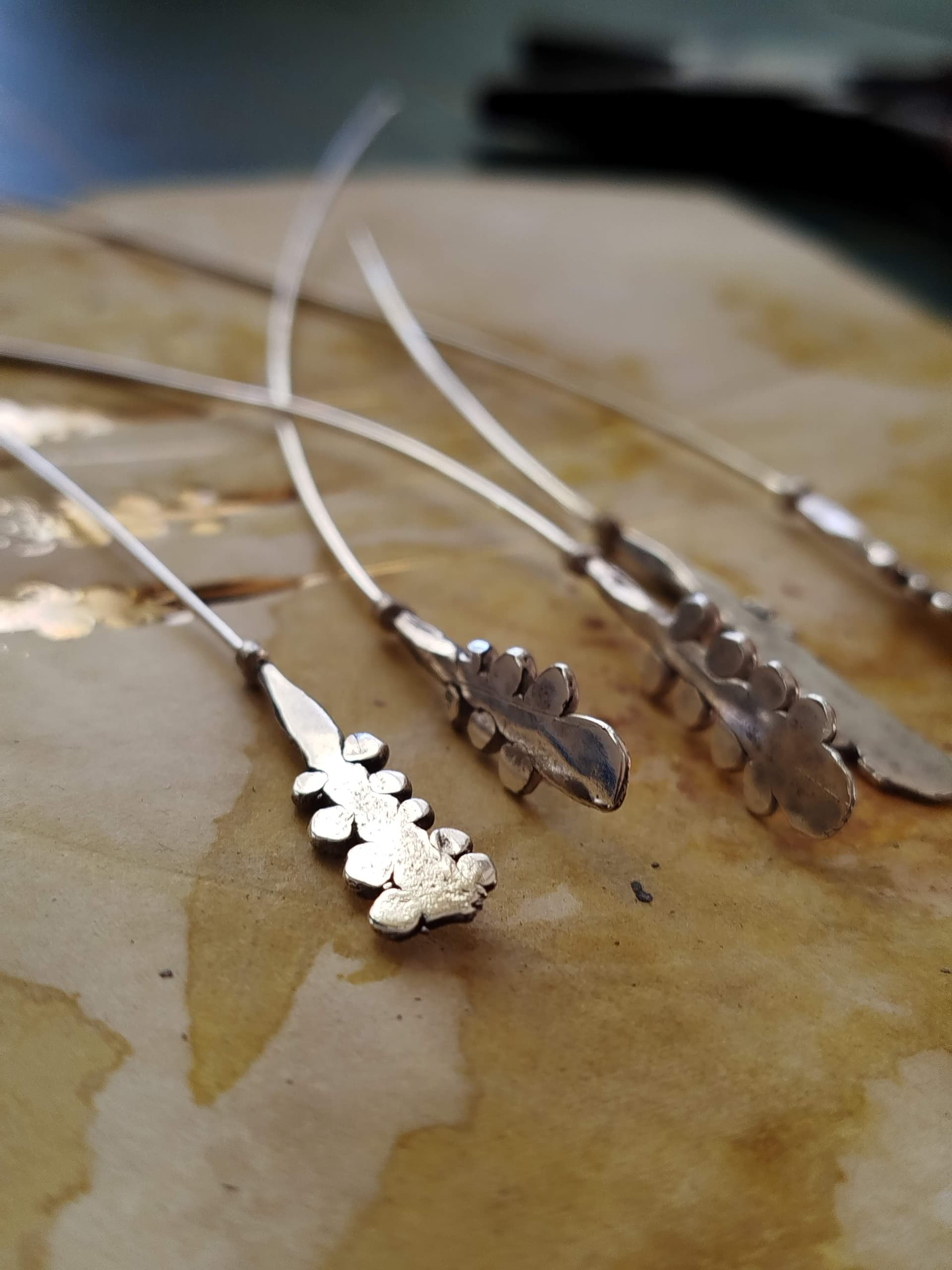 Detail of silver earrings