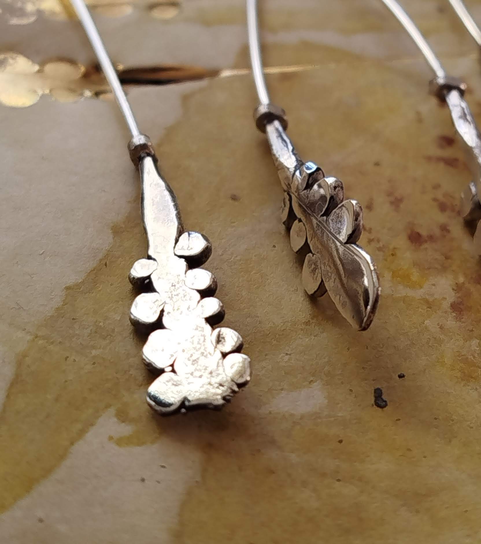 Detail of silver earrings