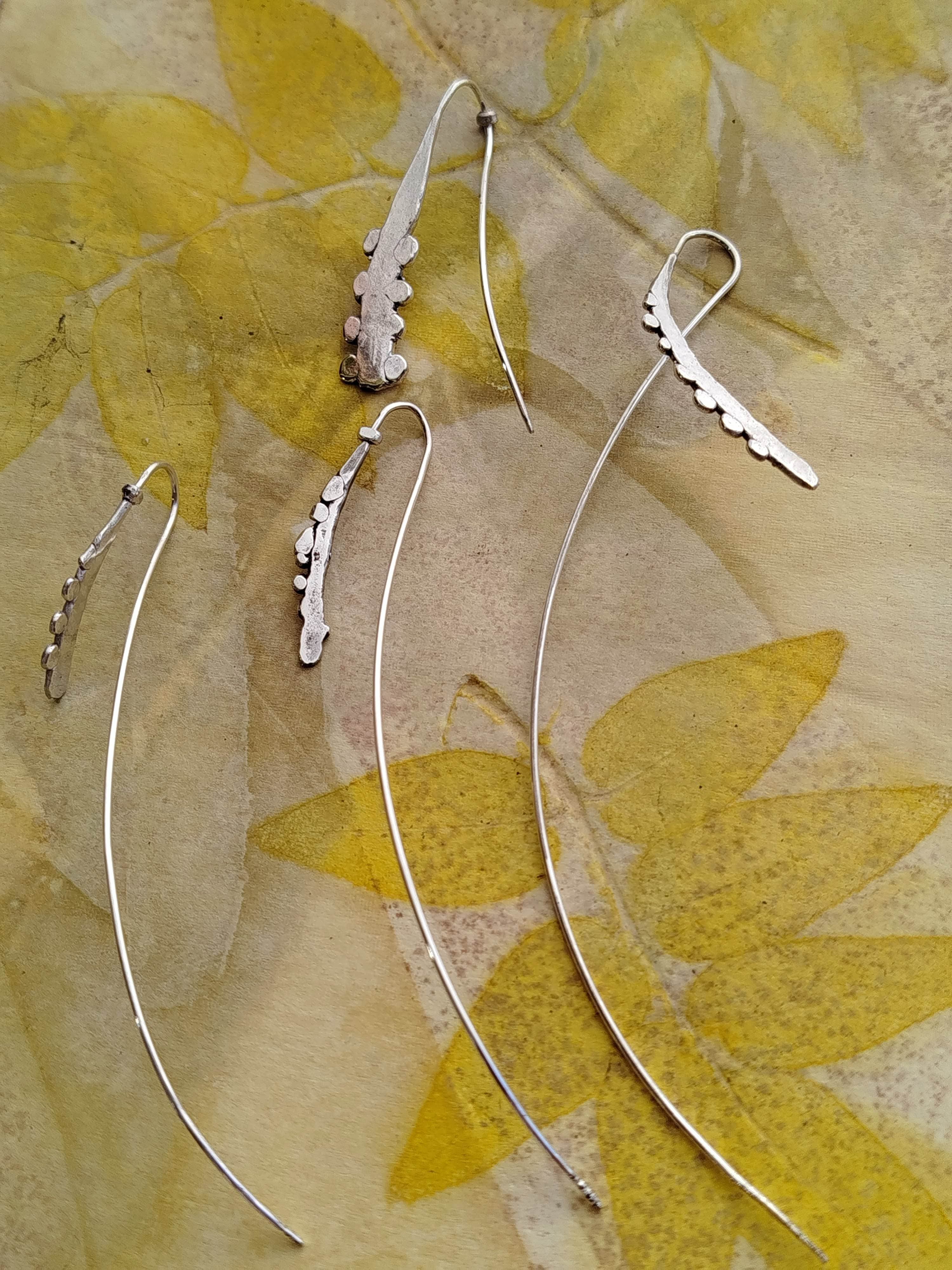 Silver earrings developed from eco-printed plant forms